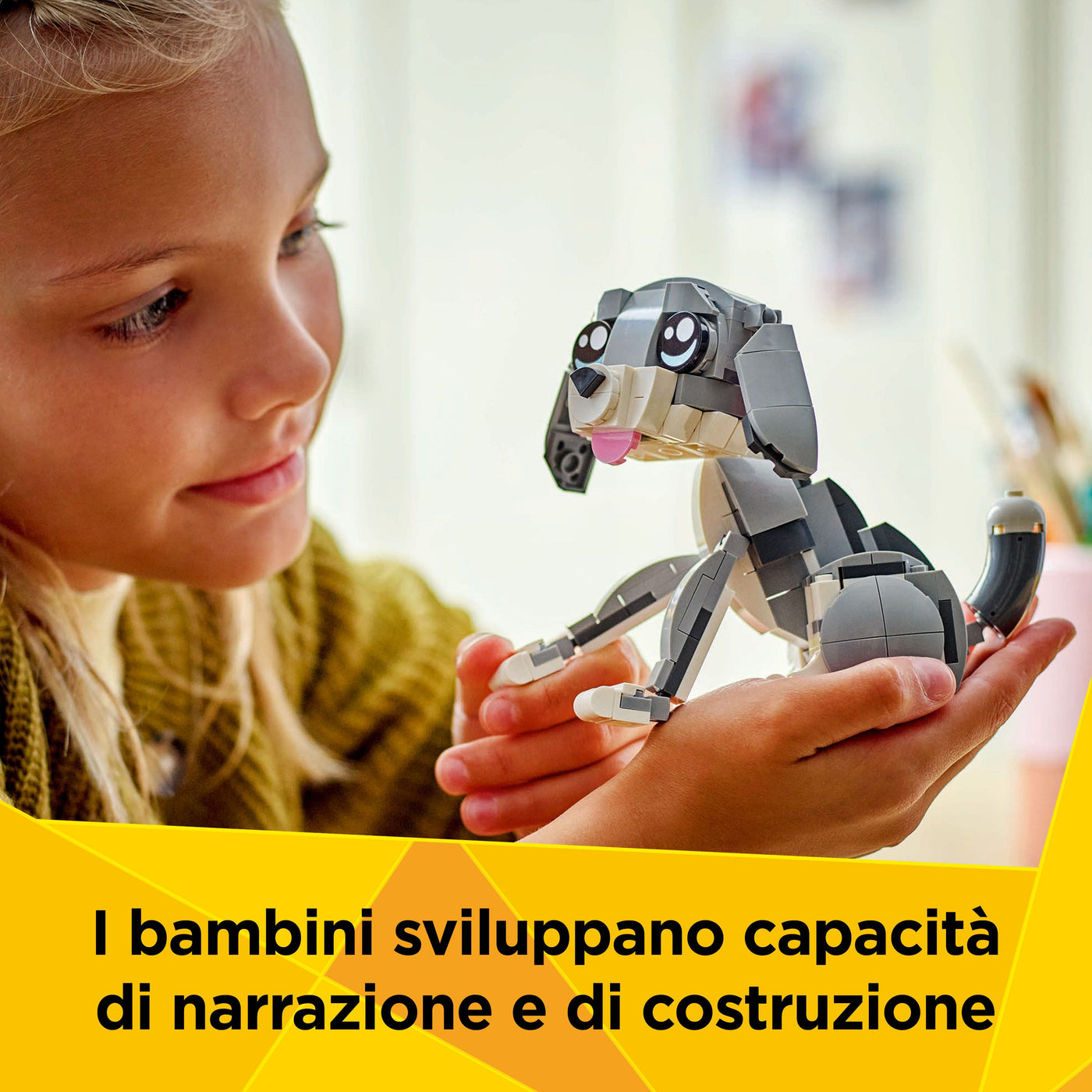Gatto giocoso fotografia promozionale "I bambini sviluppano capacità di narrazione e di costruzione"