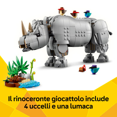 Animali selvatici: maestoso rinoceronte con uccelli fotografia promozionale "Il rinoceronte giocattolo include 4 uccelli e una lumaca"