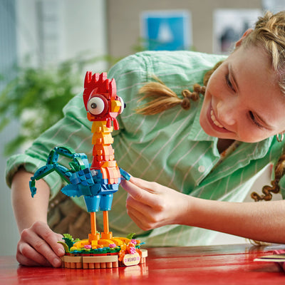 HeiHei fotografia bambina che gioca con il set lego