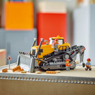 Bulldozer giallo fotografia costruita in ambiente domestico da esposizione
