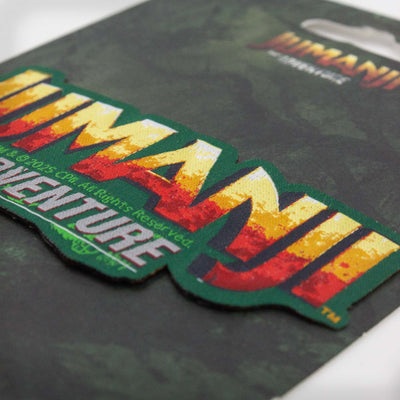 Fotografia dettaglio ricamo della Patch Jumanji con zoom