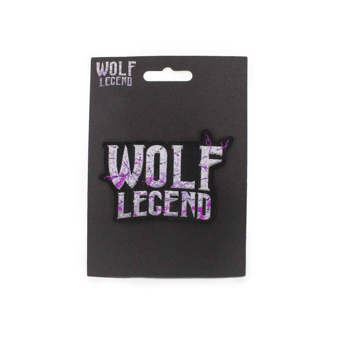 Patch Wolf Legend visione frontale della Patch con il logo dell'attrazione Wolf Legend di Gardaland Park e il cartoncino di confezionamento