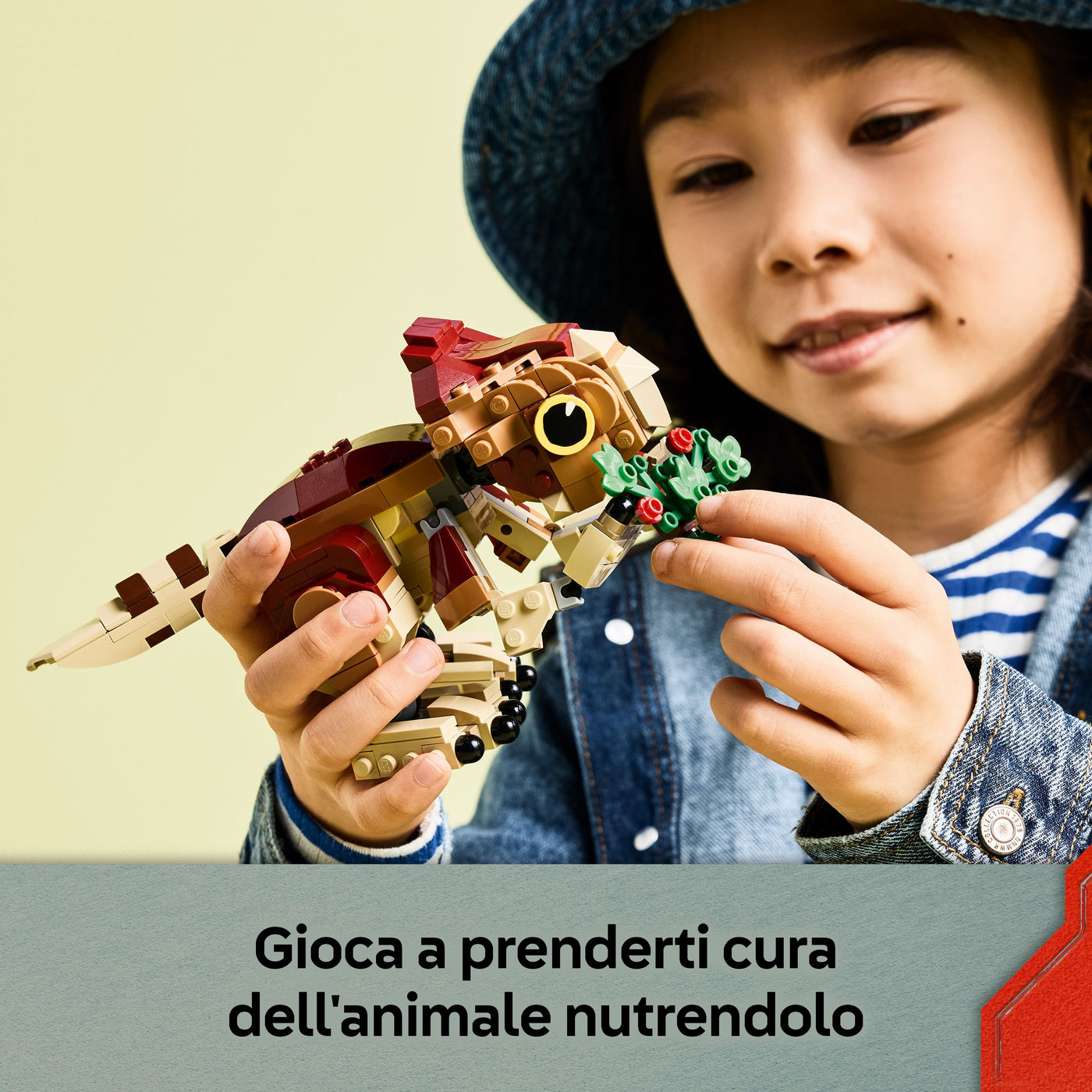 Dinosauro cucciolo Dolores: Aquilops fotografia promozionale "Gioca a prenderti cura dell'animale nutrendolo"